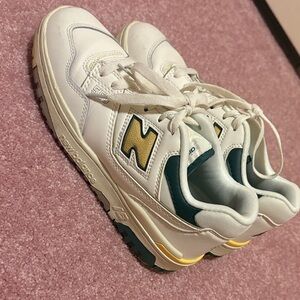 New Balance White and Gold Sneakers
